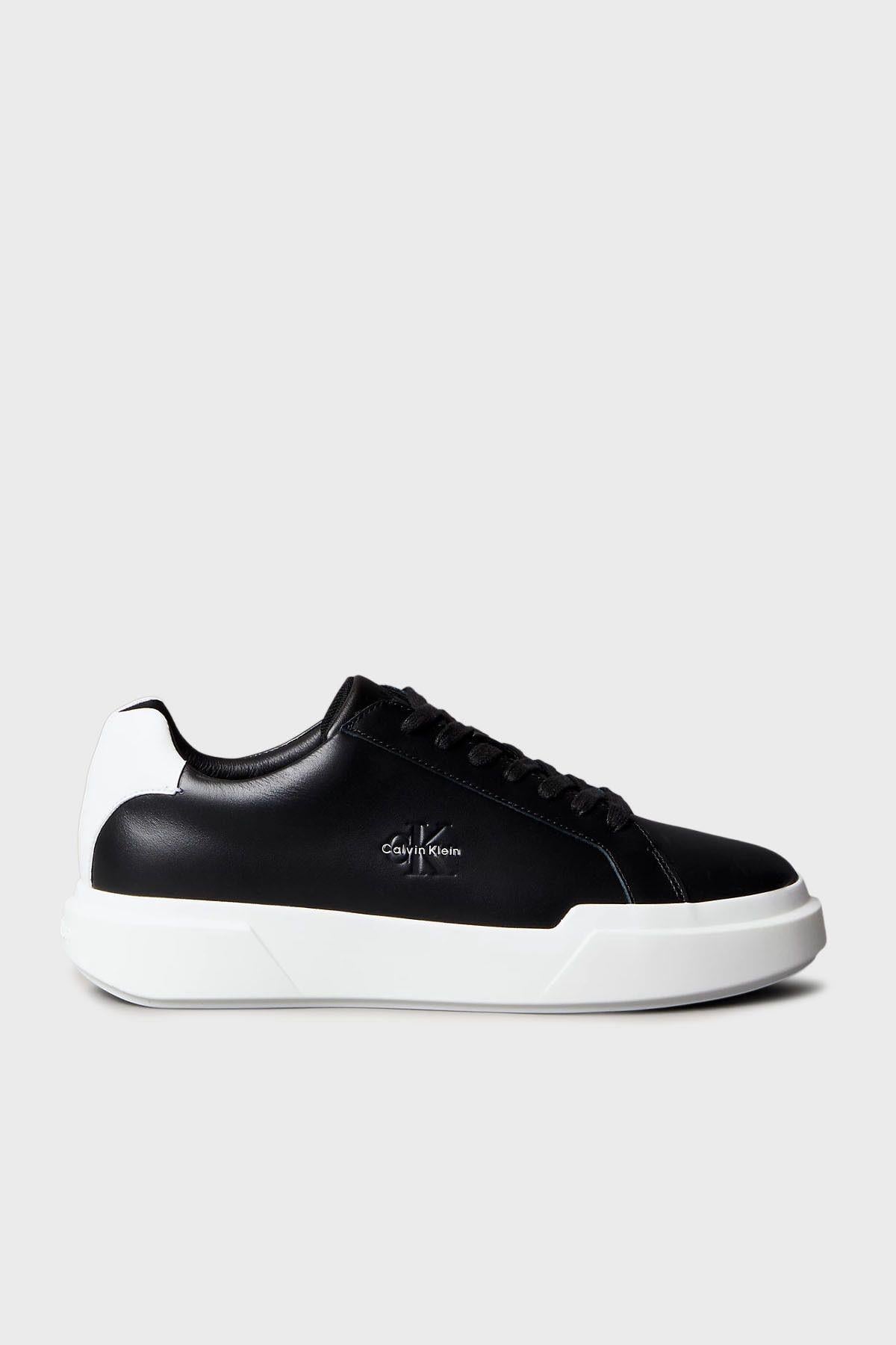 deri-logolu-kalin-taban-sneaker-ayakka-a777b7.jpg