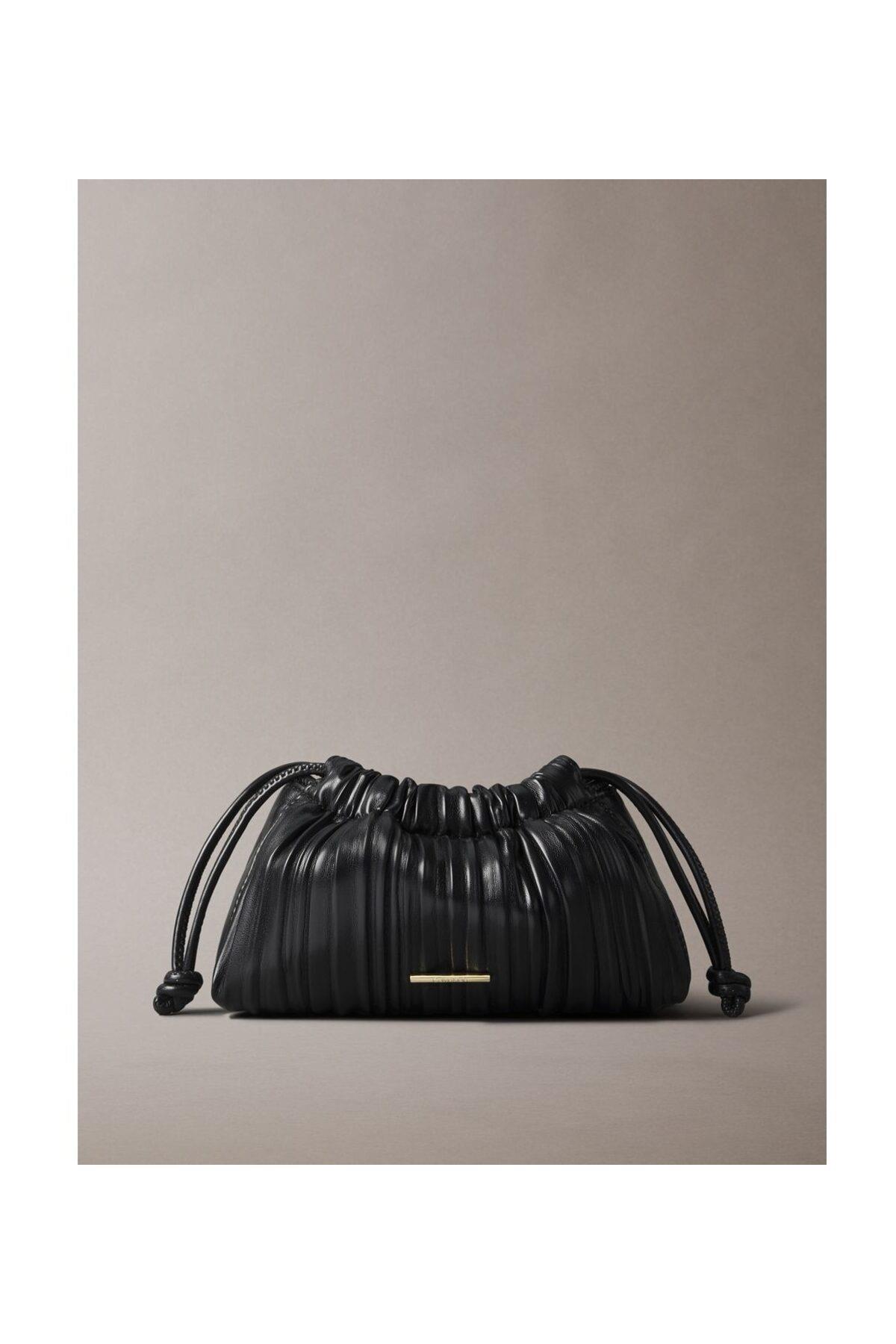 plisse-mini-drawstring-bag-0-b917.jpg