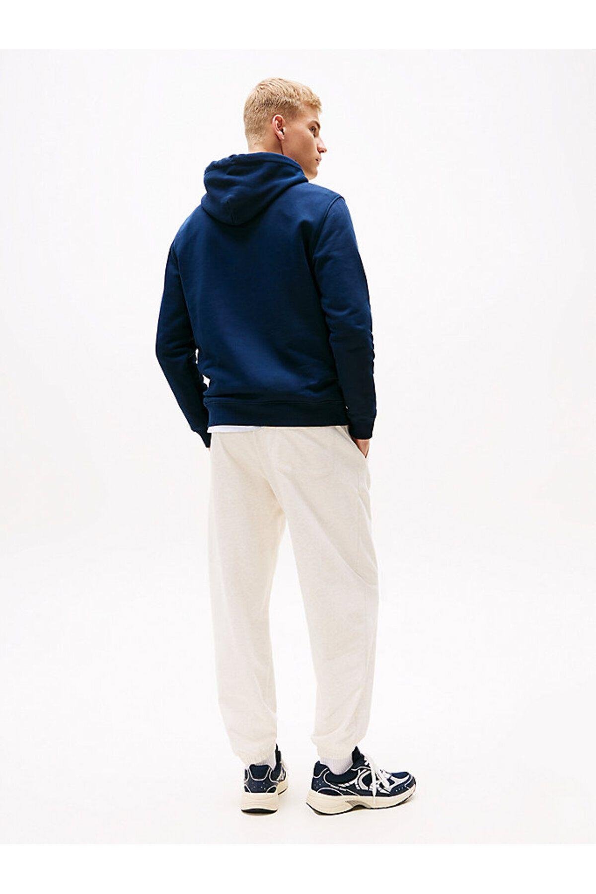 tjm-reg-badge-hoodie-ext-957fdf.jpg