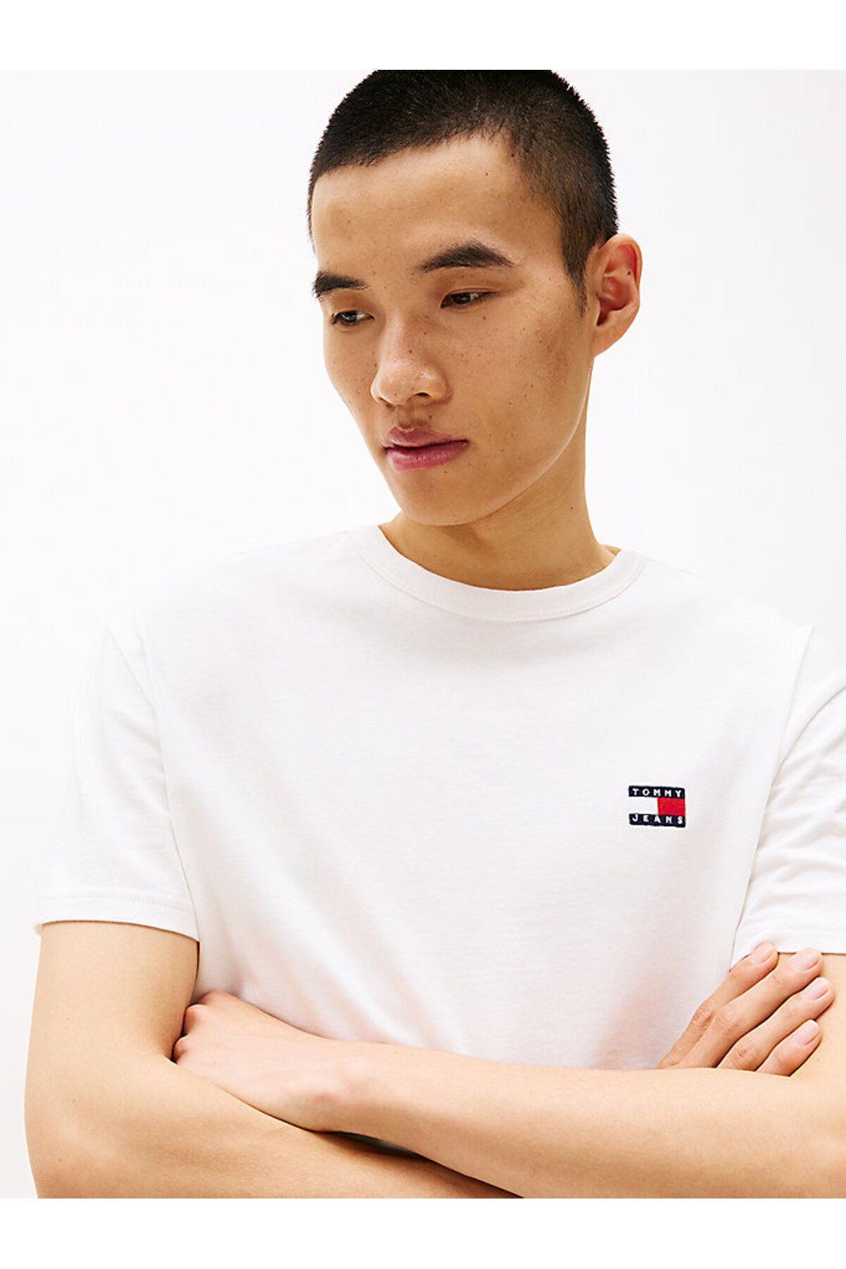 tjm-reg-badge-tee-ext-62e00b.jpg