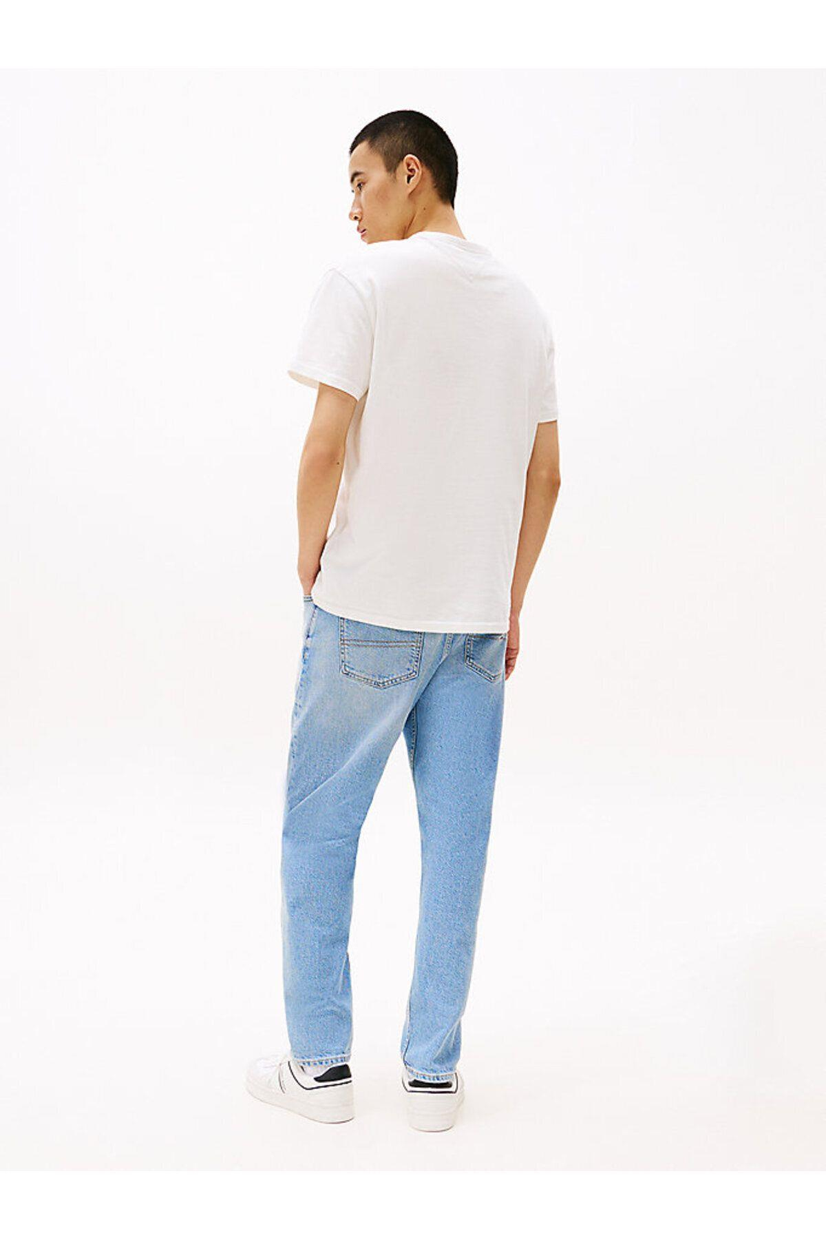 tjm-reg-badge-tee-ext-7572b8.jpg