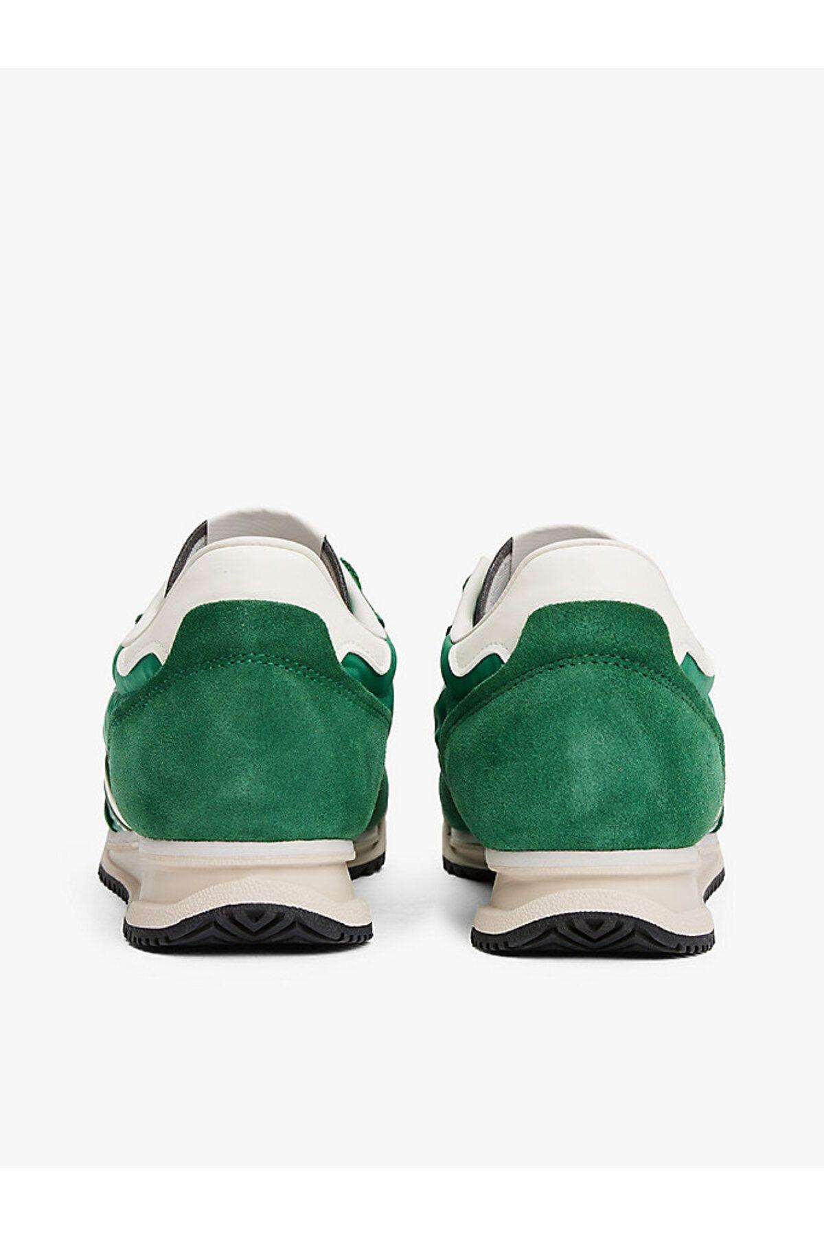 tjm-retro-runner-cleated-64d5ab.jpg