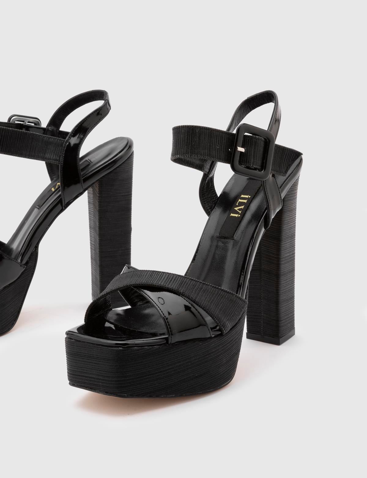 Janya Black Fabric-Leather Women's Sandal