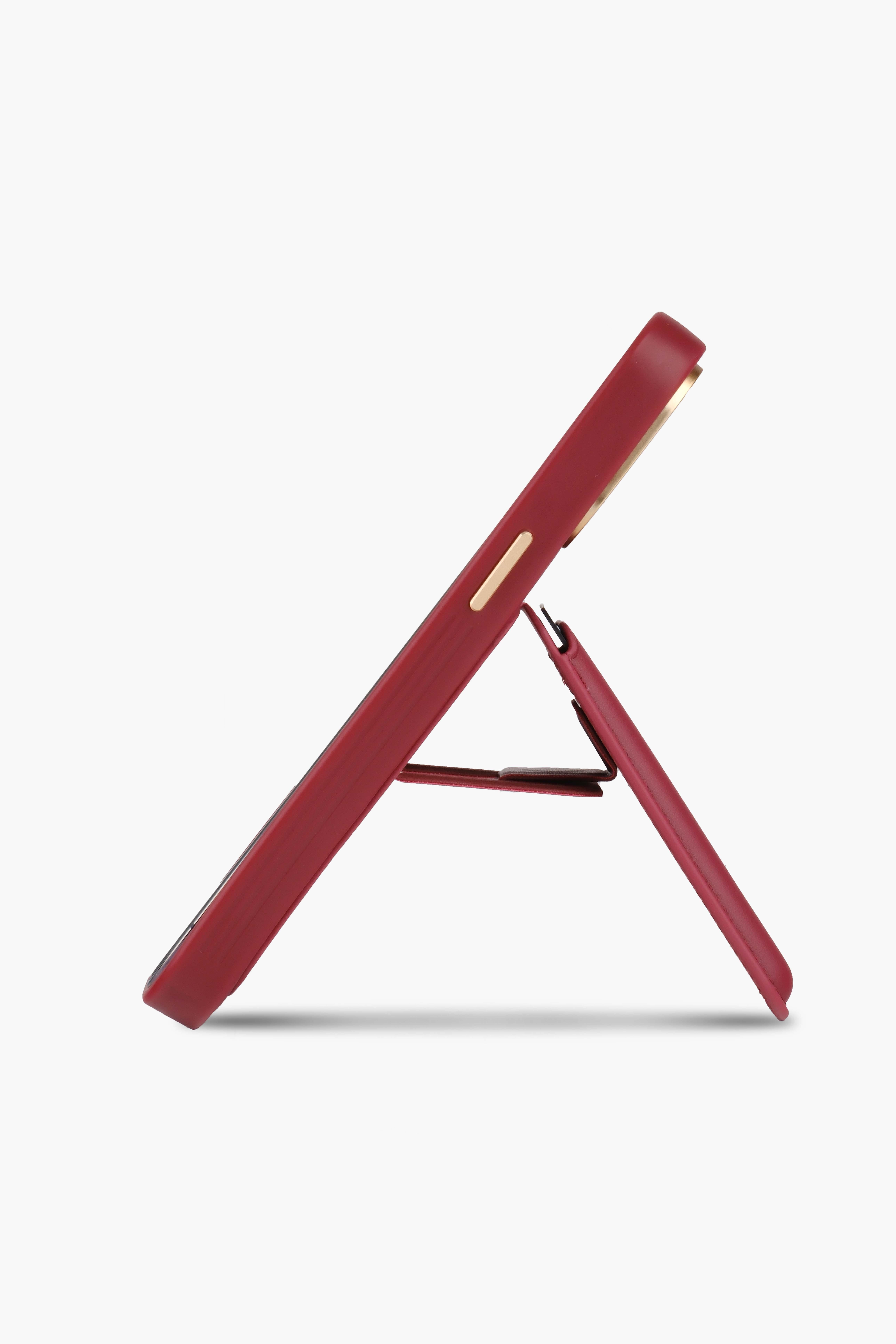 Standlı Gold Detaylı iPhone 15 Pro Max Bordo Deri Telefon Kılıfı15 pro maxWATCHOFROYALİPHONE15PROMAXStandlı Gold Detaylı iPhone 15 Pro Max Bordo Deri Telefon Kılıfı