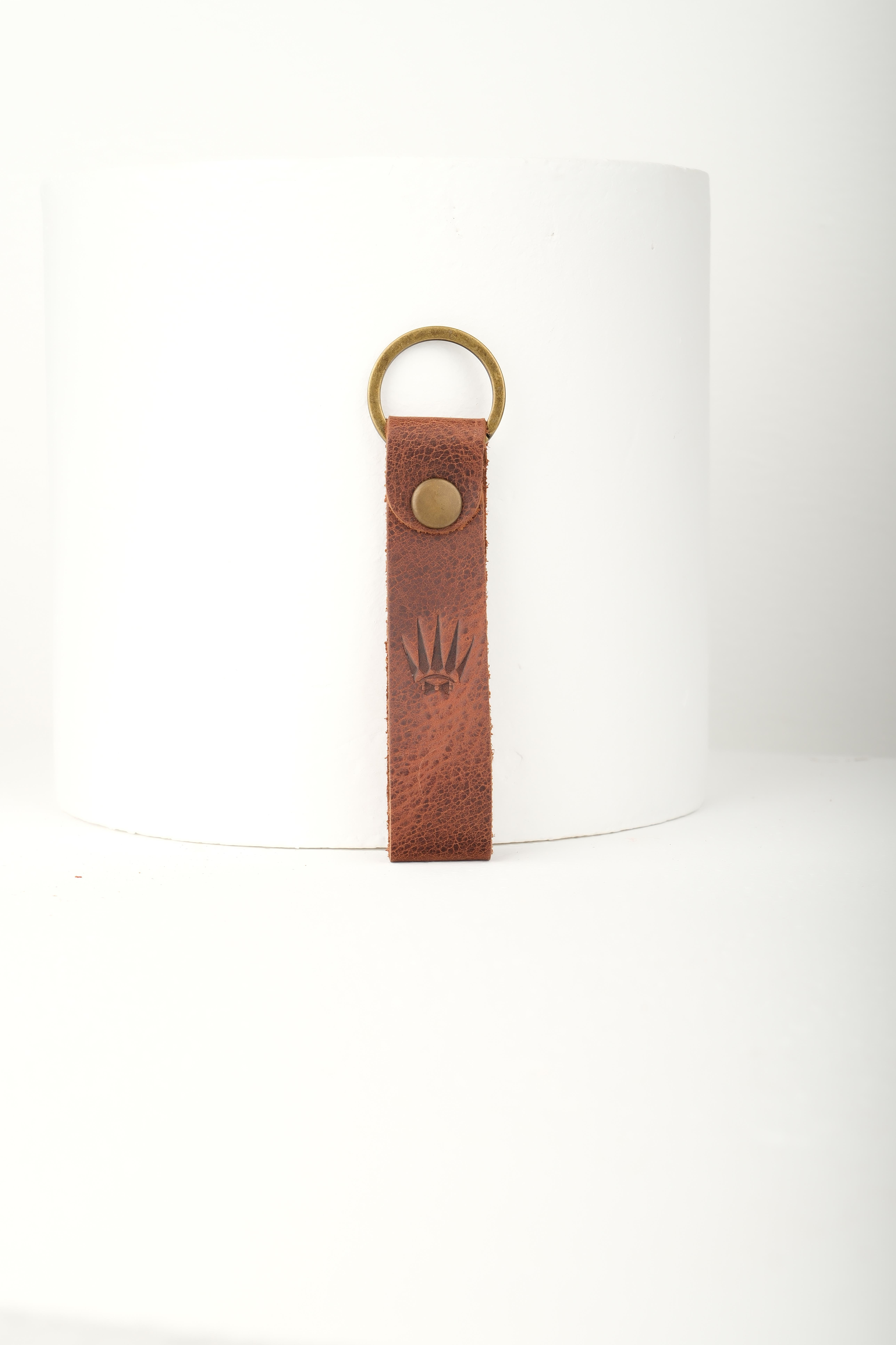 BOULDER TIGUAN TAN KEY CHAINKey ChainWATCHOFROYALBOULDERANHTRLKTGNTBBOULDER TIGUAN TAN KEY CHAIN