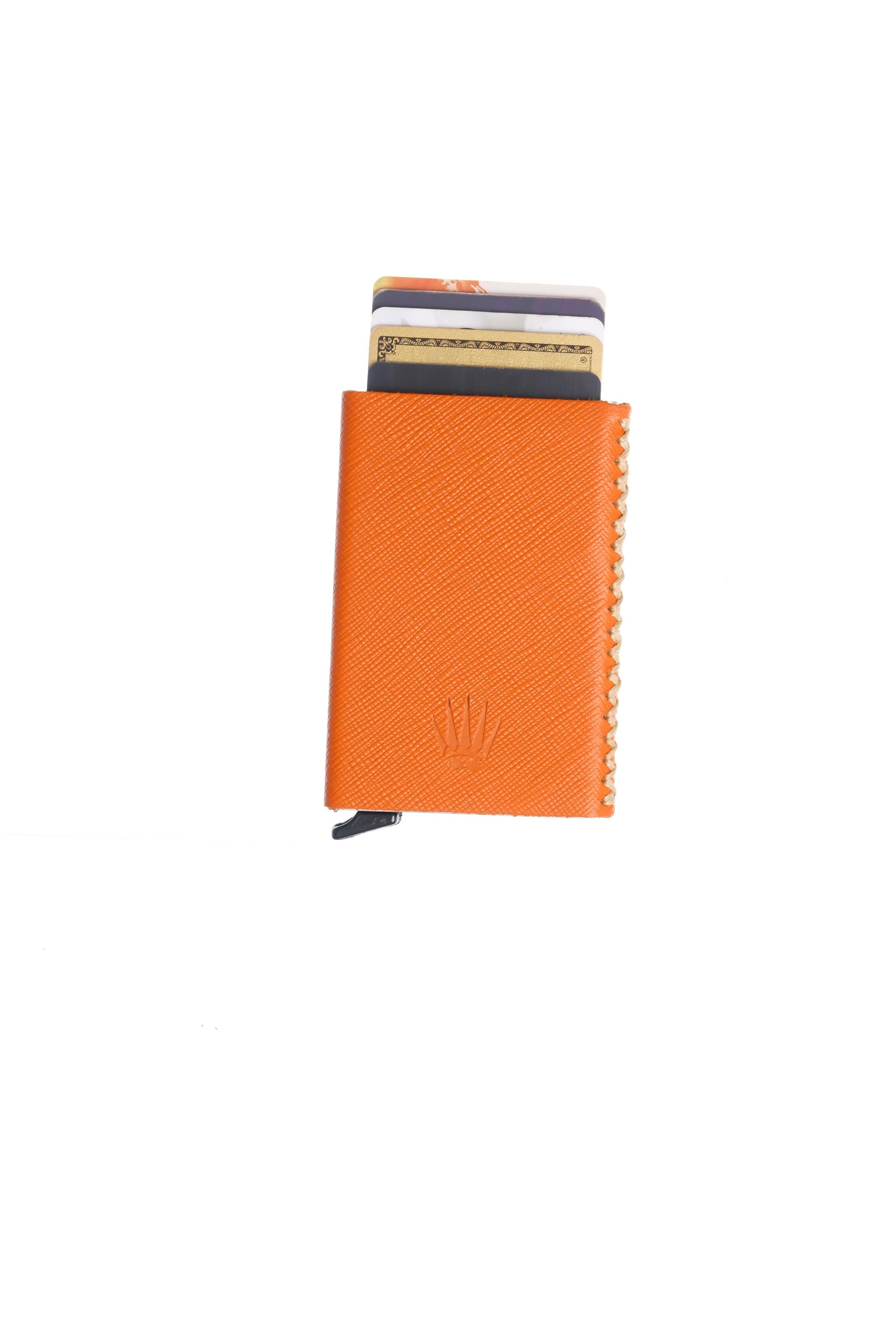 Cortex Slim Saffiano Turuncu Hakiki Deri Bölmeli Kızaklı Mekanizmalı KartlıkCüzdan ve KartlıkWATCHOFROYALCortexCortex Slim Saffiano Turuncu Hakiki Deri Bölmeli Kızaklı Mekanizmalı Kartlık