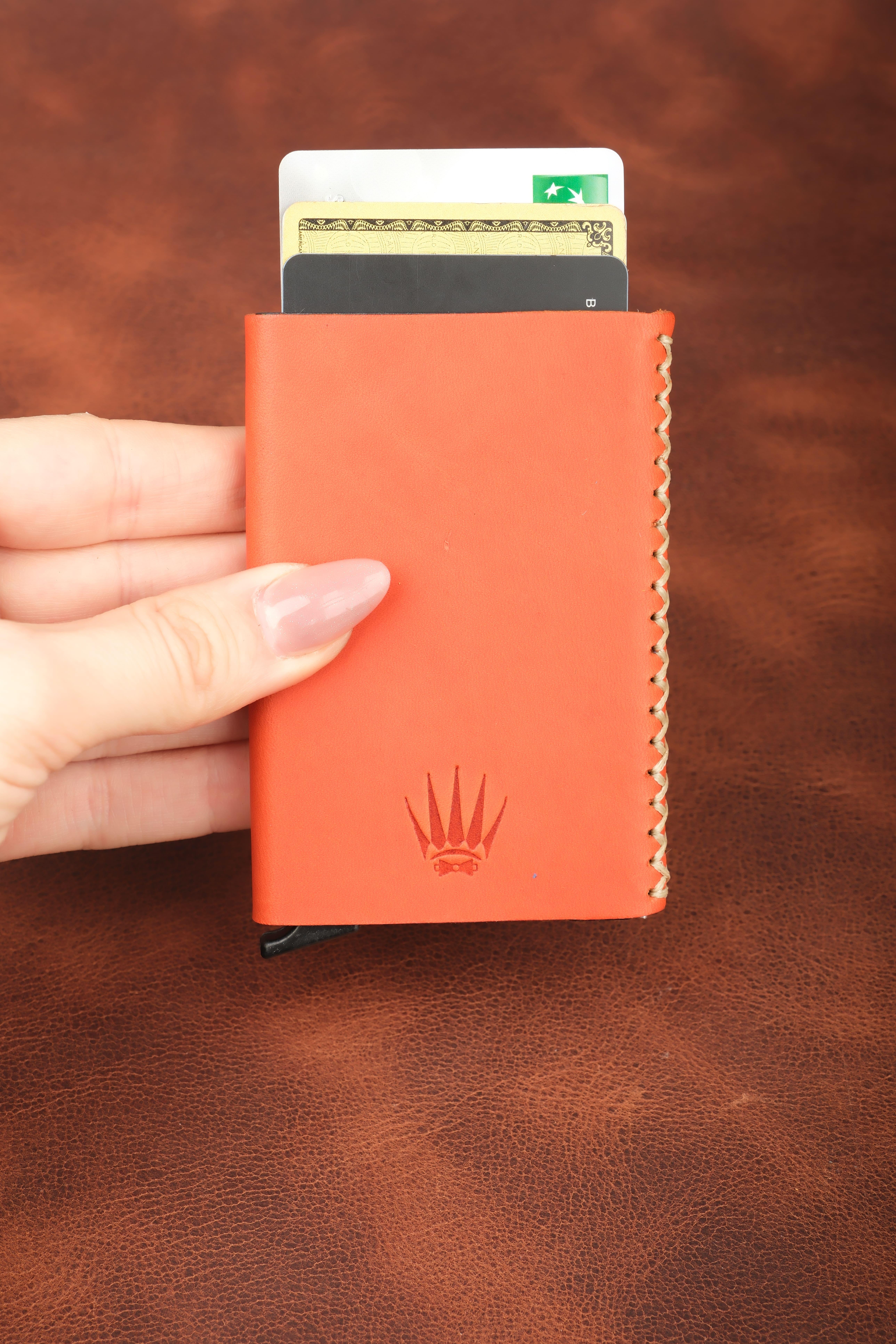 Hediye Seti Hakiki Deri Turuncu Mekanizmalı Kartlık&AnahtarlıkCüzdan ve KartlıkWATCHOFROYALCortexHediye Seti Hakiki Deri Turuncu Mekanizmalı Kartlık&Anahtarlık