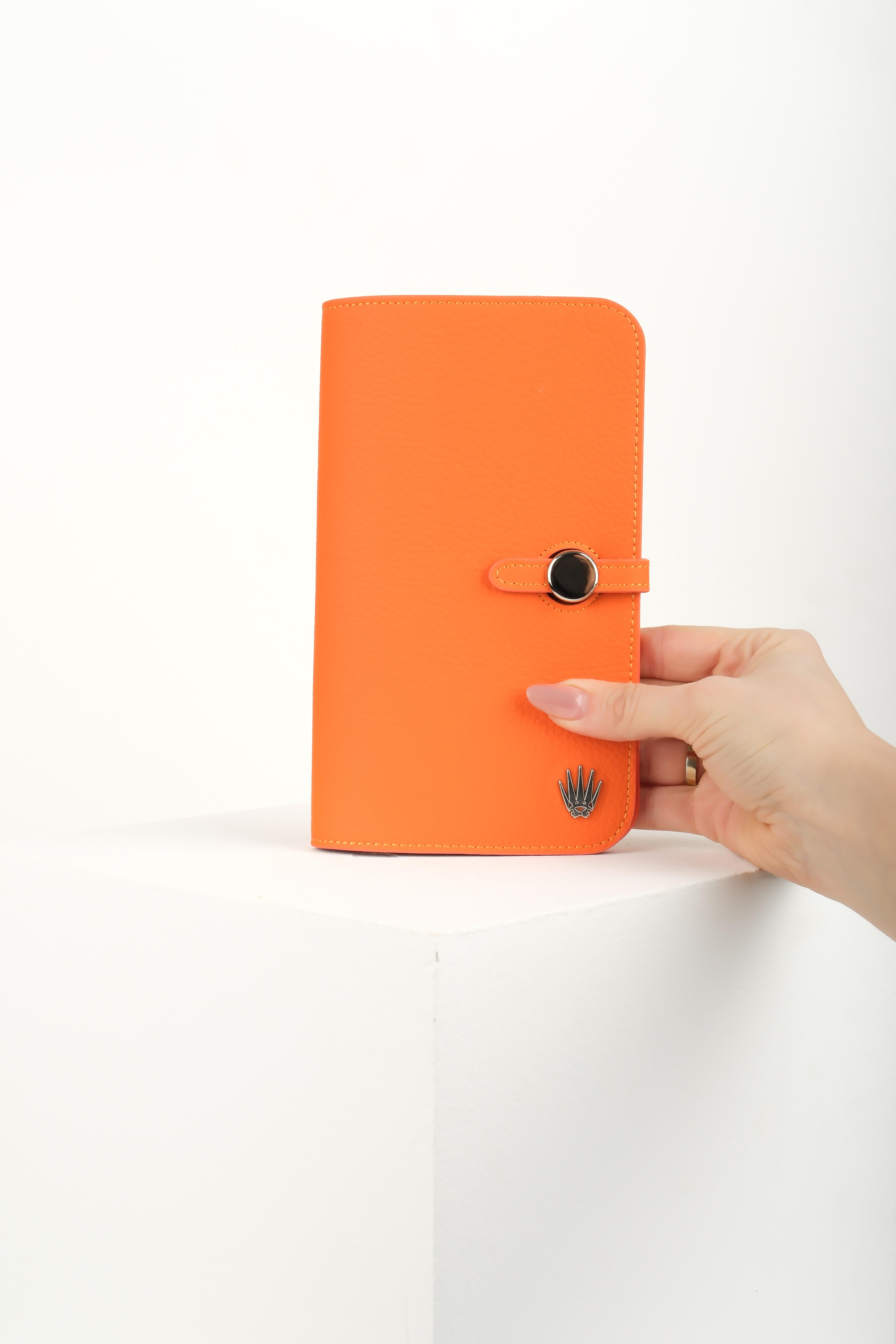 DIONİS TURUNCU HAKİKİ DERİ TELEFON CÜZDANI VE KARTLIKTelefon CüzdanıWATCHOFROYALdionisDIONİS TURUNCU HAKİKİ DERİ TELEFON CÜZDANI VE KARTLIK