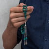 Metal Püsküllü Arpa Kesim Sıkma Kehribar Tesbih