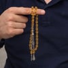 Metal Püsküllü Bal Rengi Sıkma Kehribar Tesbih