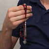 Metal Püsküllü Kırmızı Siyah Sıkma Kehribar Tesbih