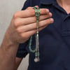 Metal Püsküllü Şeffaf Su Yeşili Sıkma Kehribar Tesbih