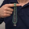 Metal Püsküllü Şeffaf Su Yeşili Sıkma Kehribar Tesbih