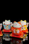 JaponyaDünyadan HediyelerDNY-HDYZMRT04TKeskin Hediyelik Eşya Ve TekstilSeramik Maneki Neko Turuncu Güneş Enerjili Şans Kedisi 12cm No.4