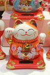 JaponyaDünyadan HediyelerDNY-HDYZMRT04TKeskin Hediyelik Eşya Ve TekstilSeramik Maneki Neko Turuncu Güneş Enerjili Şans Kedisi 12cm No.4