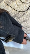 Siyah Renk Kabartma Desenli Triko Etek