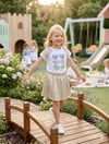 Kız Çocuk Gözlük Detaylı Pamuk Penye Tişört Pamuk Saten Piliseli Etek 2 Li TakımAlt-Üst TakımHilal Akıncı Kids