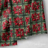 Örgü Karelerin Kırmızı Yılbaşı Çiçeği – 3D Poinsettia Dijital Baskılı Kumaş