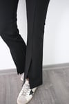 HAND PAÇA YIRTMAÇLI SİYAH PANTOLON