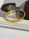 Çelik Gold Renk Nazar Boncuklu Kelepçe Bileklik