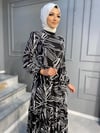 NEVON 776 ÖZEL KOLEKSİYON KENDİNDEN DESENLİ TİRİL TİRİL KUMAŞ ELBİSE MODELİMİZ