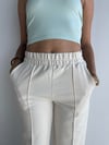 Kadın Lastikli Yüksek Bel Yırtmaçlı Bol Paça Beyaz Pantolon-Pantolon-Tf The Fancy For You-9093-2-Kadın Lastikli Yüksek Bel Yırtmaçlı Bol Paça Beyaz Pantolon