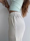 Kadın Lastikli Yüksek Bel Yırtmaçlı Bol Paça Beyaz Pantolon-Pantolon-Tf The Fancy For You-9093-2-Kadın Lastikli Yüksek Bel Yırtmaçlı Bol Paça Beyaz Pantolon