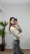 Kadın krem parmak geçmeli esnek body