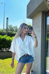 Kadın önü kısa arkası uzun v yaka bluz