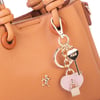 Nas Bag Kadın Charmlı Mini El ve Çapraz Çanta (en :19 cm , boy:15 cm) Hardal Lopez