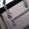 Nas Bag Kadın El ve Omuz Çantası Gri Siyah Lacst  (en:28 cm ; boy:21 cm )