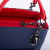 Nas Bag Kadın El ve Omuz Çantası Lacivert Kırmızı Lacst  (en:28 cm ; boy:21 cm )