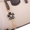 Nas Bag Mini Çiçek Charmlı Kadın  Şık El ve Çapraz Çanta (en 25 cm ;boy 22 cm ) Kum Kahve