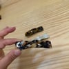 K4248 BÜZGÜ DETAYLI OTOMATİK KLİPSLİ 3'LÜ KEMİK TOKA