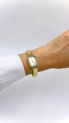 Oval Gold Taşlı Beyaz Kadranlı Saat