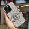 Apple iPhone 15 Pro Chanel Logolu Kumaş Kaplamalı Telefon Kılıfı