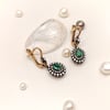 0.79ct Zümrüt ve 0.57ct Elmas Taşlı Oval Küpe 8 Ayar Altın  HD VİDEOLU