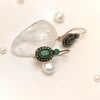1.20ct Zümrüt ve 0.20ct Elmas Taşlı Oval Sallanan Küpe 8 Ayar Altın  HD VİDEOLU