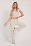 Kadın Slim Fit Dar Kesim Yarım Balıkçı Yaka Kısa Kollu Bej Bluz