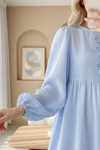 Önü Fiyonk Detaylı Kolları Lastikli Müslin Elbise -Bebe Mavi-Elbise-349-7071-R32