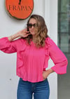 PEMBE PİLİSELİ FIRFIRLI BLUZ 