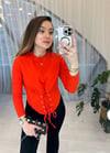 TURUNCU KUŞ GÖZÜ DETAY BLUZ