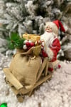 Kızaklı Noel Baba 34x34 Cm Kırmızı Kürklü Kızağı Hediye Dolu Torbalı Yeni Yıl Yılbaşı Konsept Dekoru