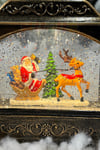 Müzikli Işıklı Motorlu Pulları Hareketli Geyikli Noel Baba 18x13 Cm Yılbaşı Yeni Yıl Dekor Süsü