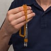 Metal Püsküllü 7x11 mm Kesme Sıkma Kehribar Tesbih