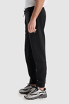 New Balance NB Lifestyle Regular Fit Normal Bel Ribanalı Paça Erkek Eşofman Altı MNP1517 BK SİYAH