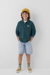 pamuklu-logolu-loose-fit-dugme-polo-ya-f79e8c.jpg