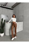 suni-deri-kadin-pantolon-33a2e7.jpg