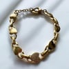 Çelik Gold Renk İç İçe Geçmeli Bileklik