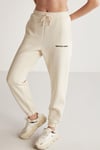 CARROLINE Kadın Nakış İşlemeli Relaxed Dar Paça Organik Pamuk Vanilya Eşofman Altı